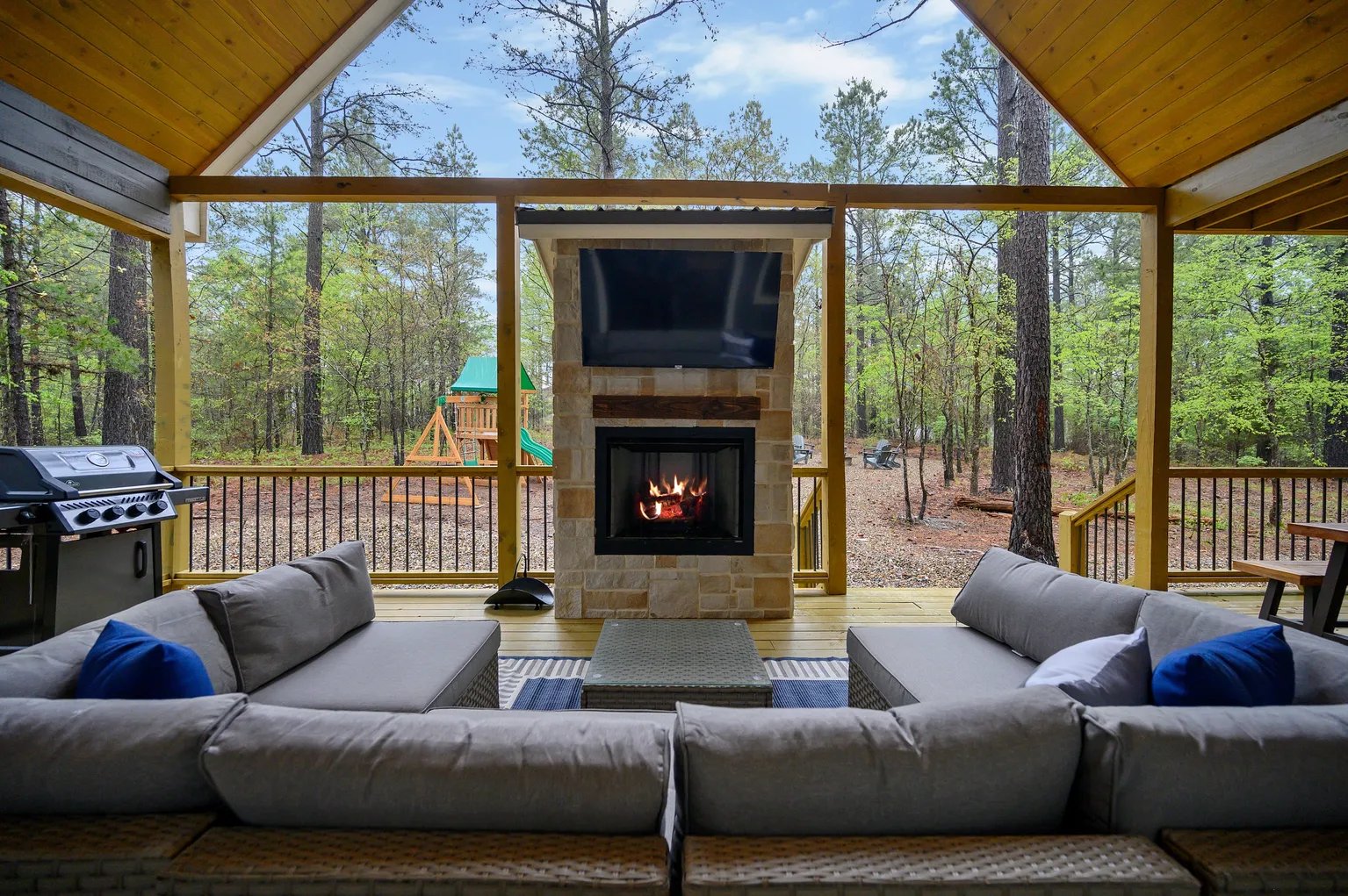Outdoor stone fireplace and seating