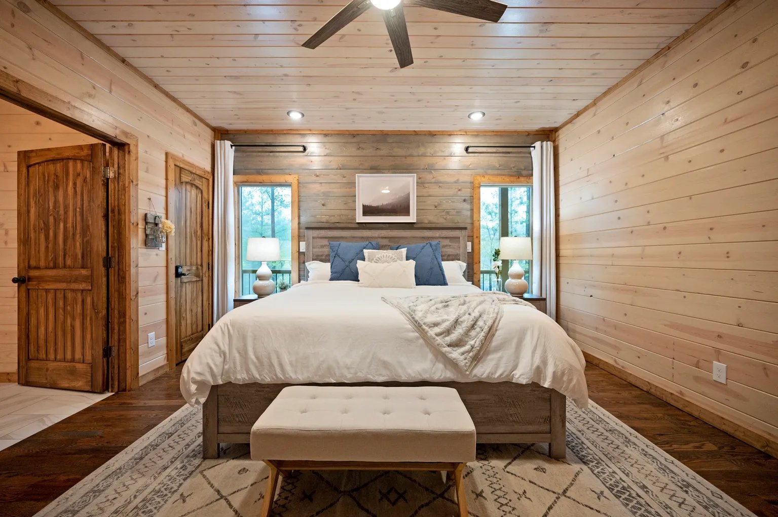 King suite with blue accent pillows