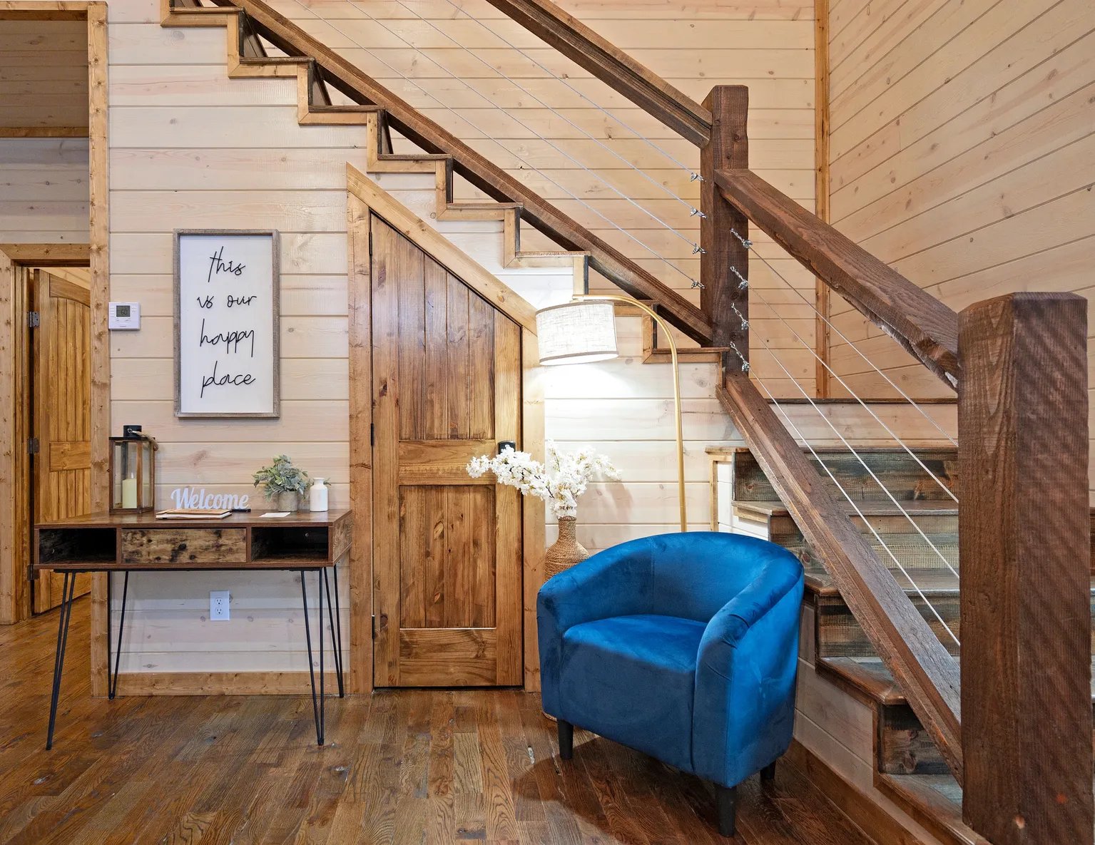 Entry sitting area under the stairs